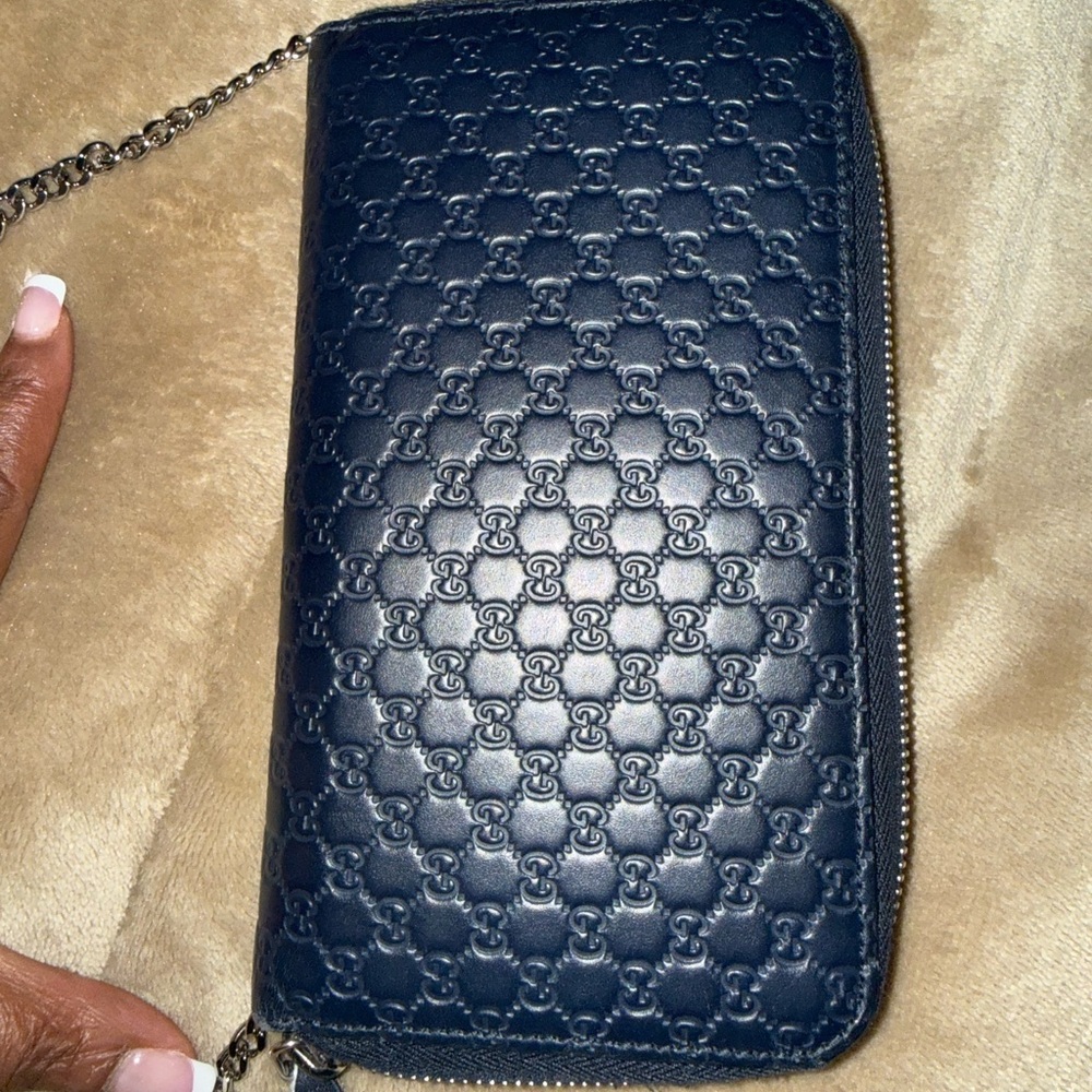 Gucci Navy Embossed Clutch with unbranded Chain. COA included.
